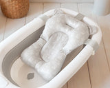 Cojín de baño ergonómico para bebé